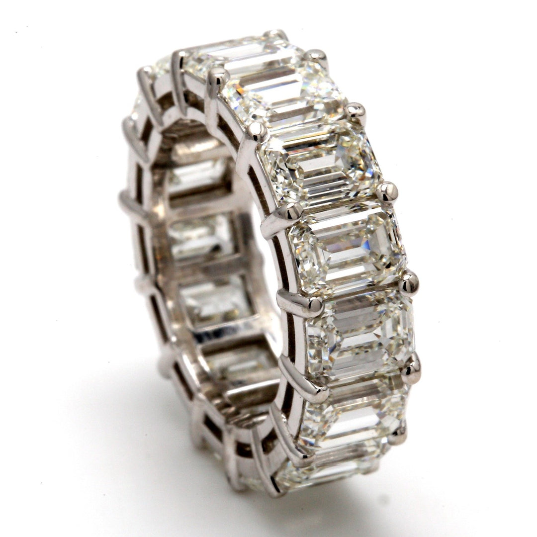 Eternity band in platinum with basket set GIA certified G-I/VVS1-VS2 (14) emerald cut diamonds.  D12.06ct.t.w.  Size 6