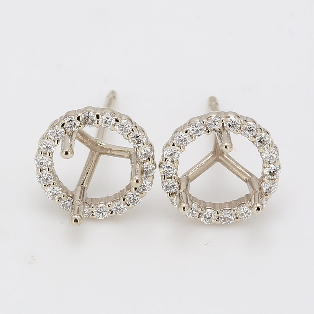 Halo semi-mount stud earrings with shared prong set round diamonds to fit 7.5mm round center.  D0.44ct.t.w.