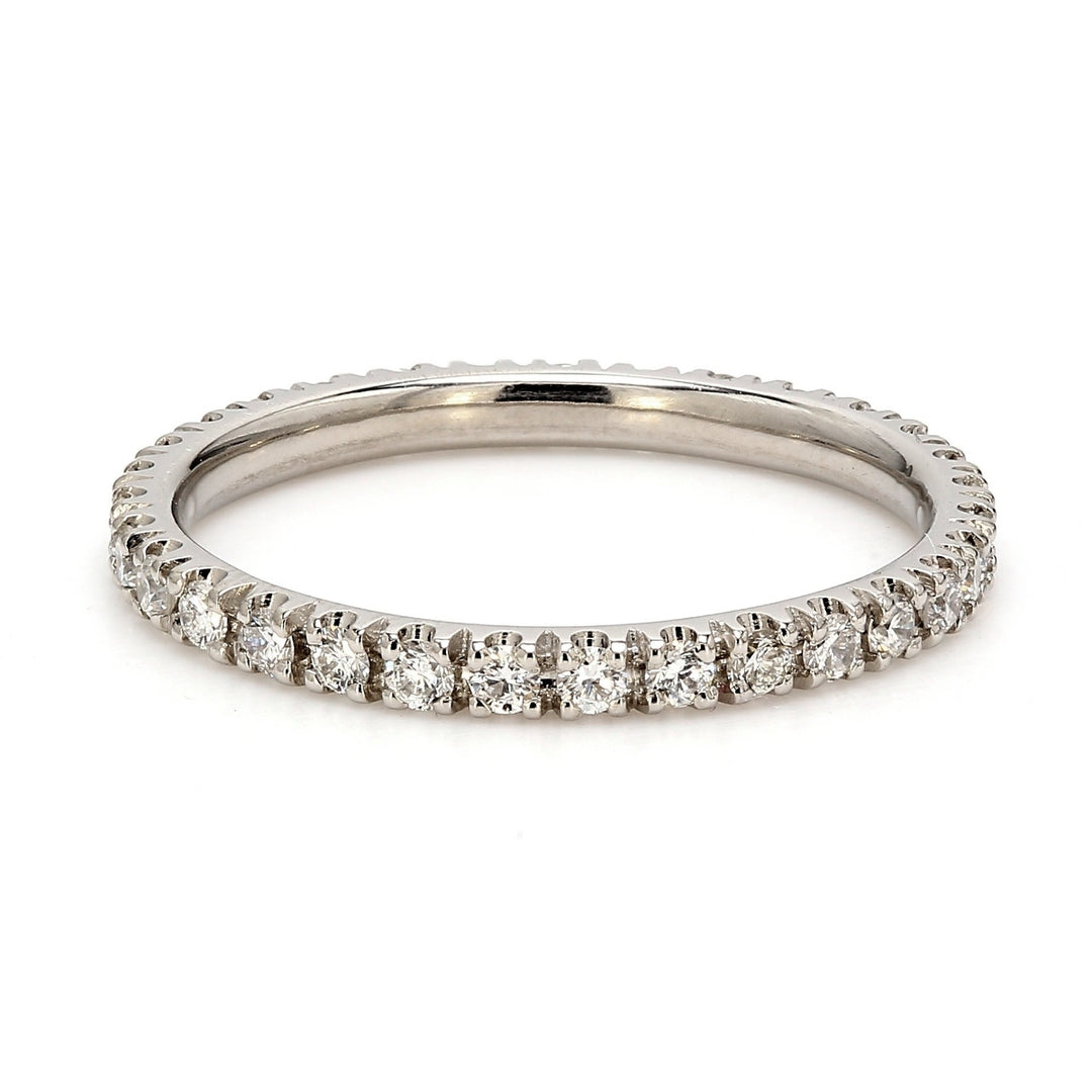 Eternity band in platinum with 4-prong set round diamonds.  D0.55ct.t.w.