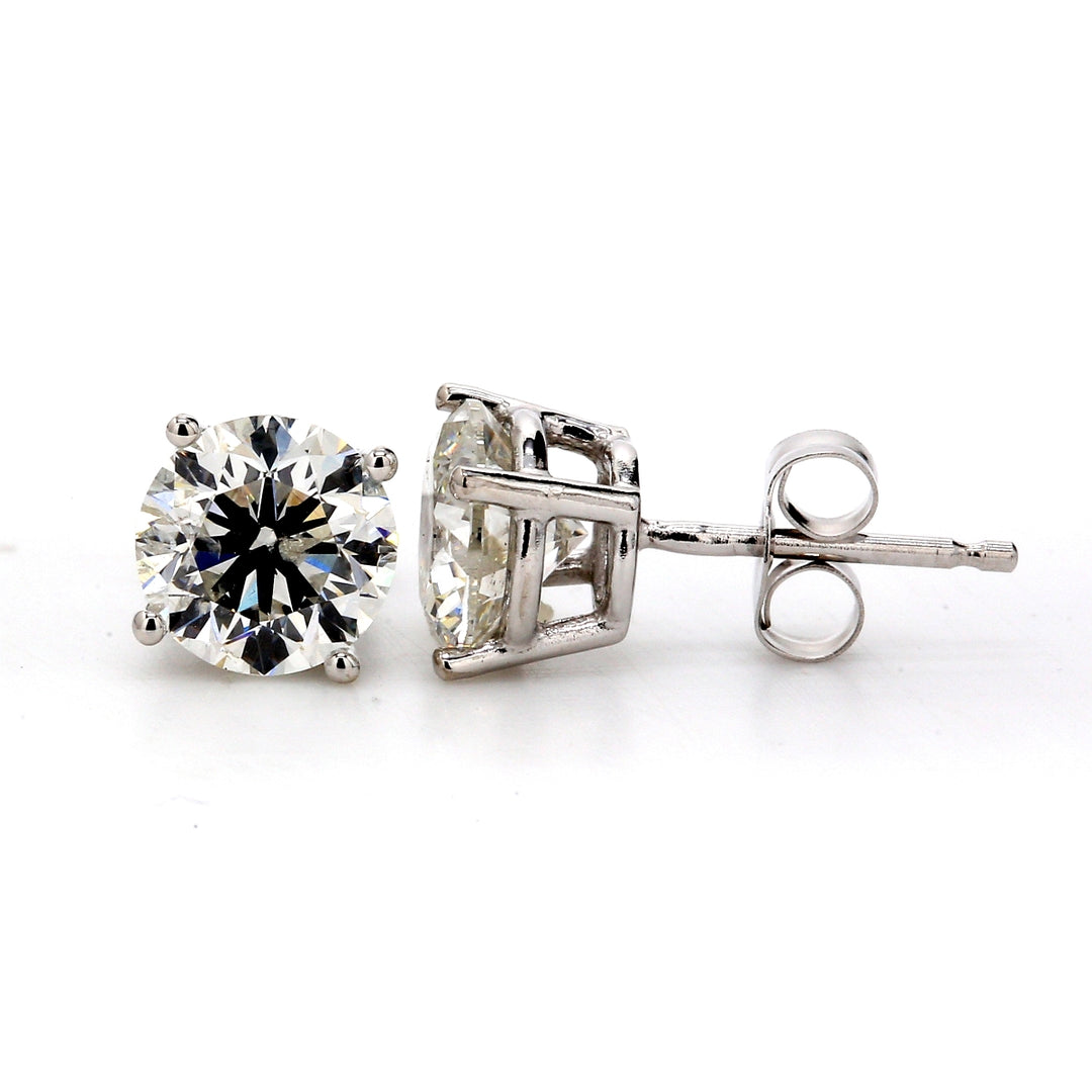 Push back stud earrings with 4-prong set USA certified F-G/SI3 round diamonds.  D2.03ct.t.w.