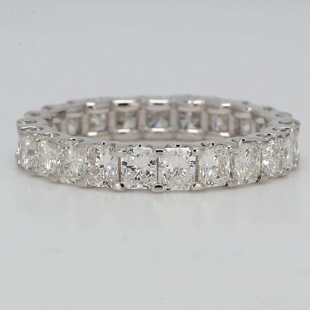 Eternity band with shared U-prong set radiant diamonds.  D3.49ct.t.w.  Size 7.25