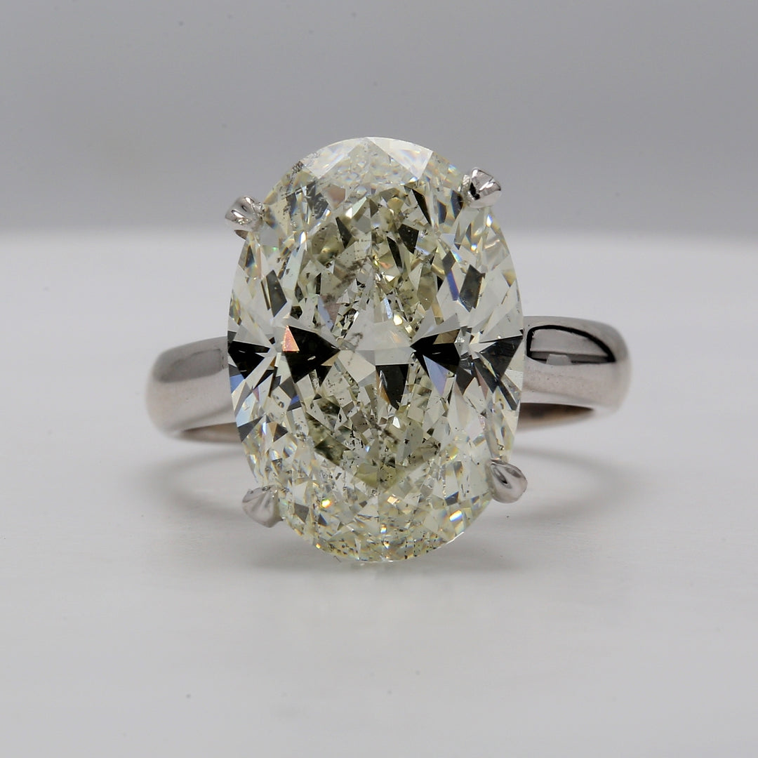 Solitaire ring with basket set GIA certified K/SI2 oval diamond.  D10.02ct.t.w.
