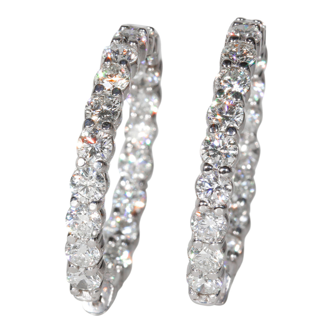 1.25"" Inside out hoop earrings with shared prong set round diamonds.  D6.88ct.t.w.