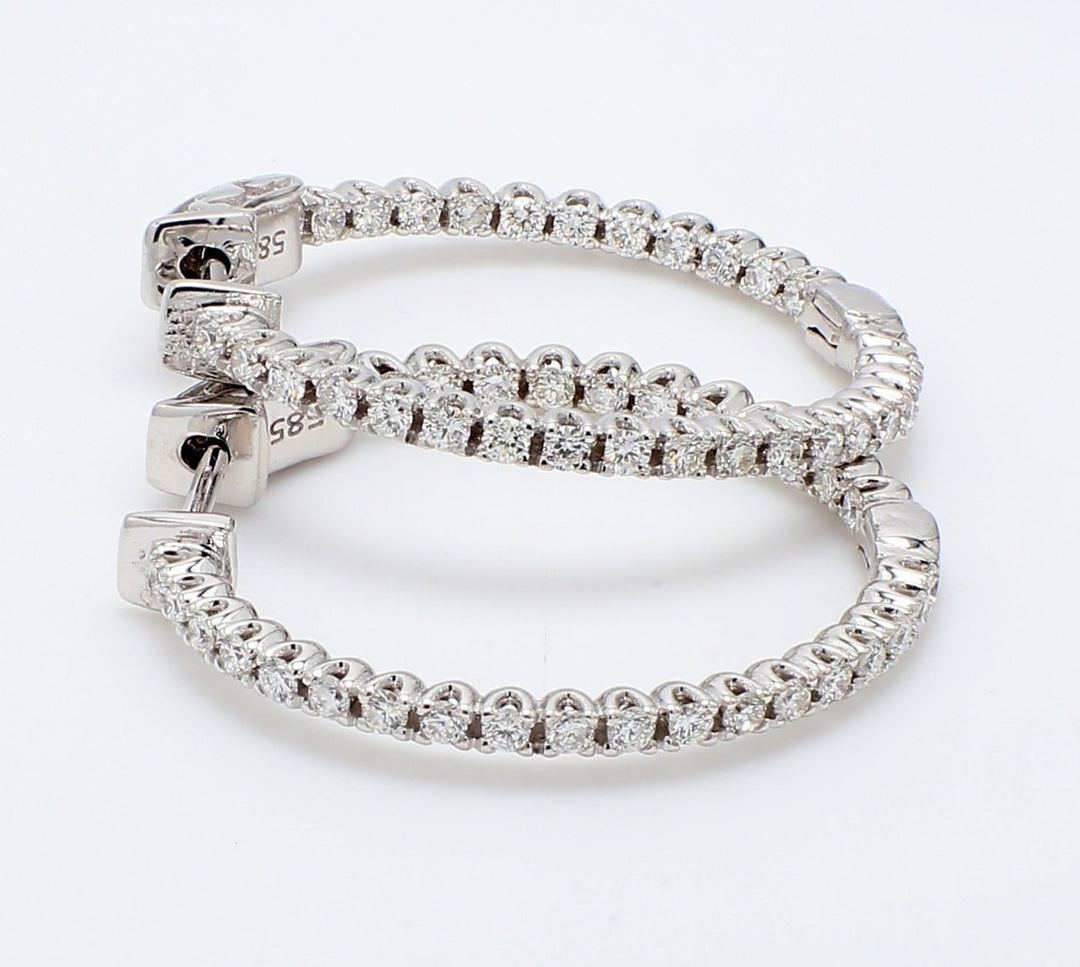 1"" Inside out hoop earrings with U-prong set (30) round diamonds & with special spring lock.  D3.07ct.t.w.