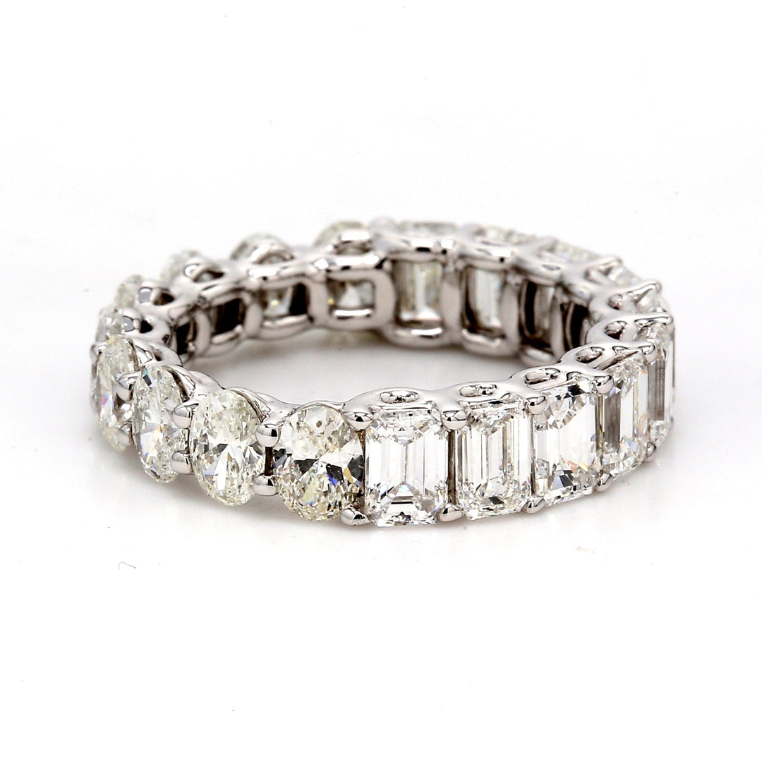 Eternity band in 18K WG with shared U-prong set oval & emerald cut diamonds.  D4.24ct.t.w.