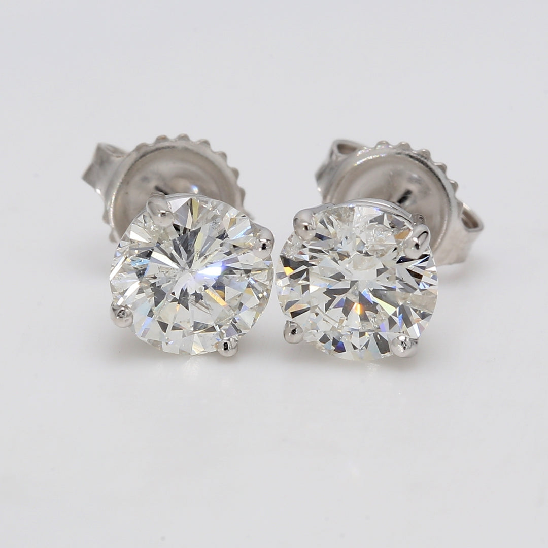 Push back stud earrings with 4-prong set USA certified F/SI3-I1 round diamonds.  D2.51ct.t.w.