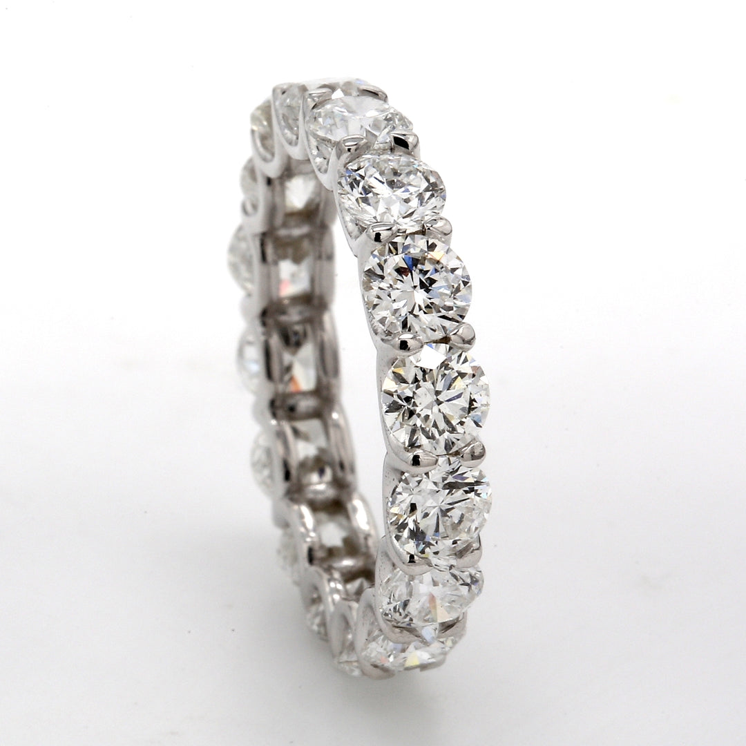 Eternity band with U-prong set round diamonds.  D1.89ct.t.w.  Size 6.75