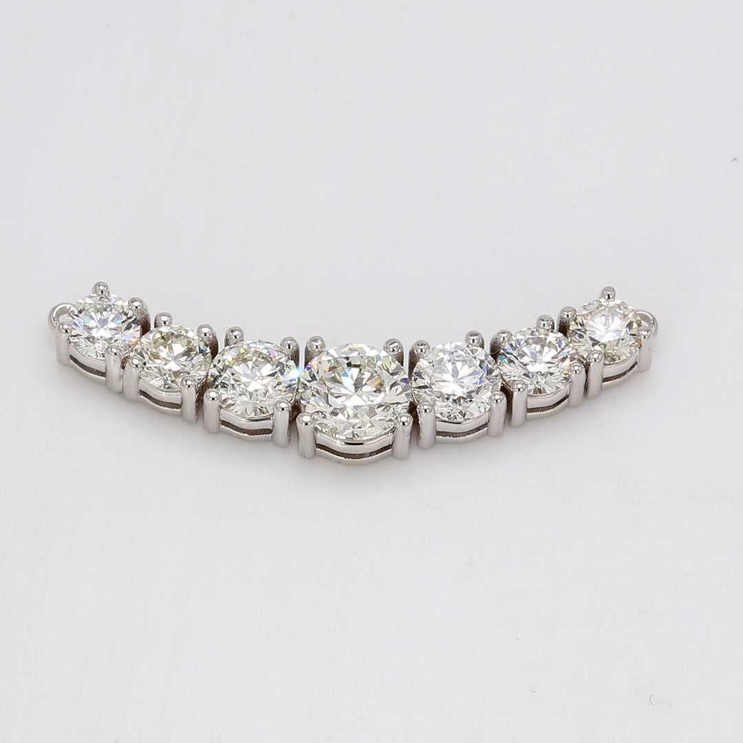 7-stone pendant in 18K WG with basket 4-prong set round diamonds.  D2.05ct.t.w.  (Center 0.50ct.)