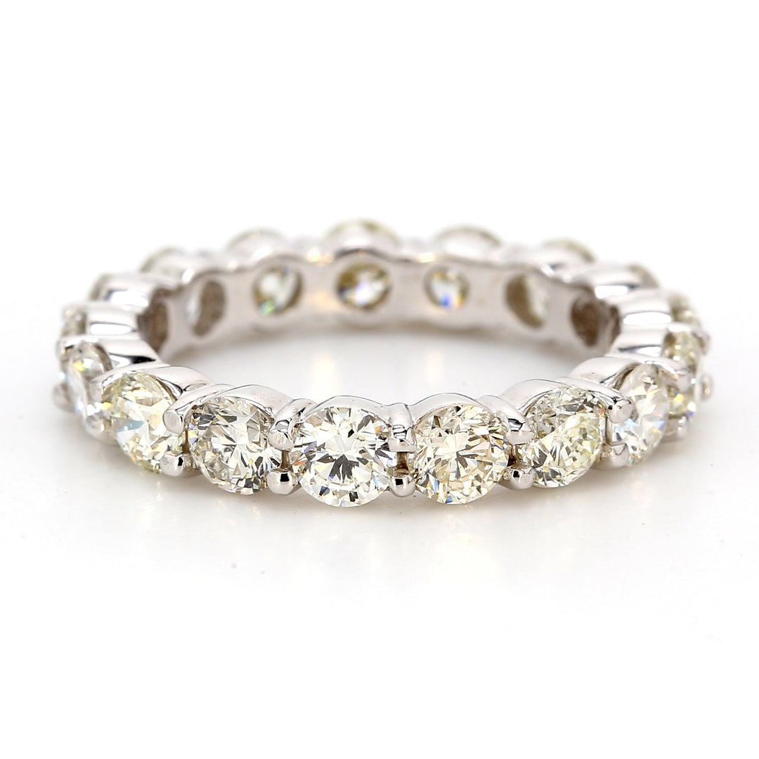 Eternity band with shared prong set (17) round diamonds.  D3.04ct.t.w.  Size 6