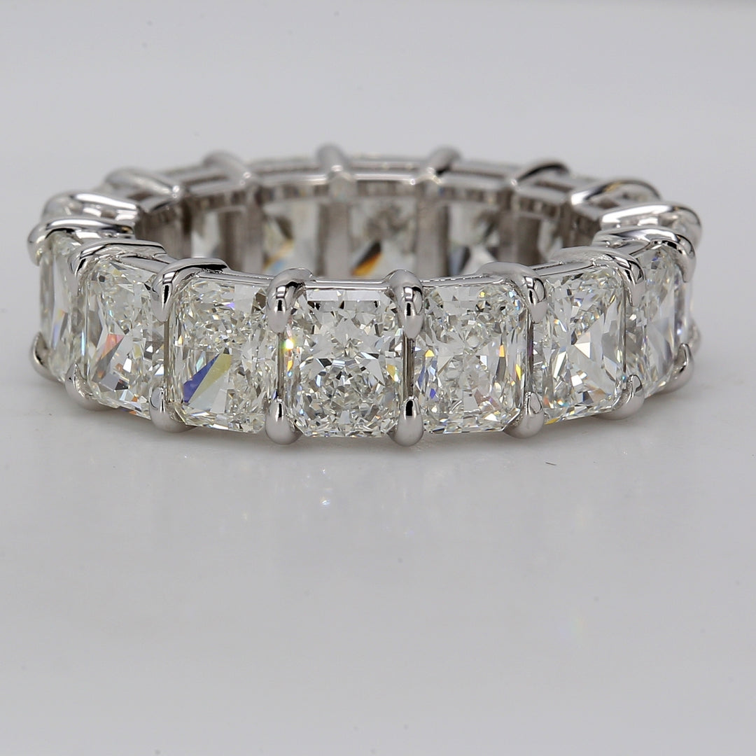 Eternity band in platinum with eagle claw set H-I/VVS-VS  (16) radiant cut diamonds.  D8.86ct.t.w.  Size 6.5