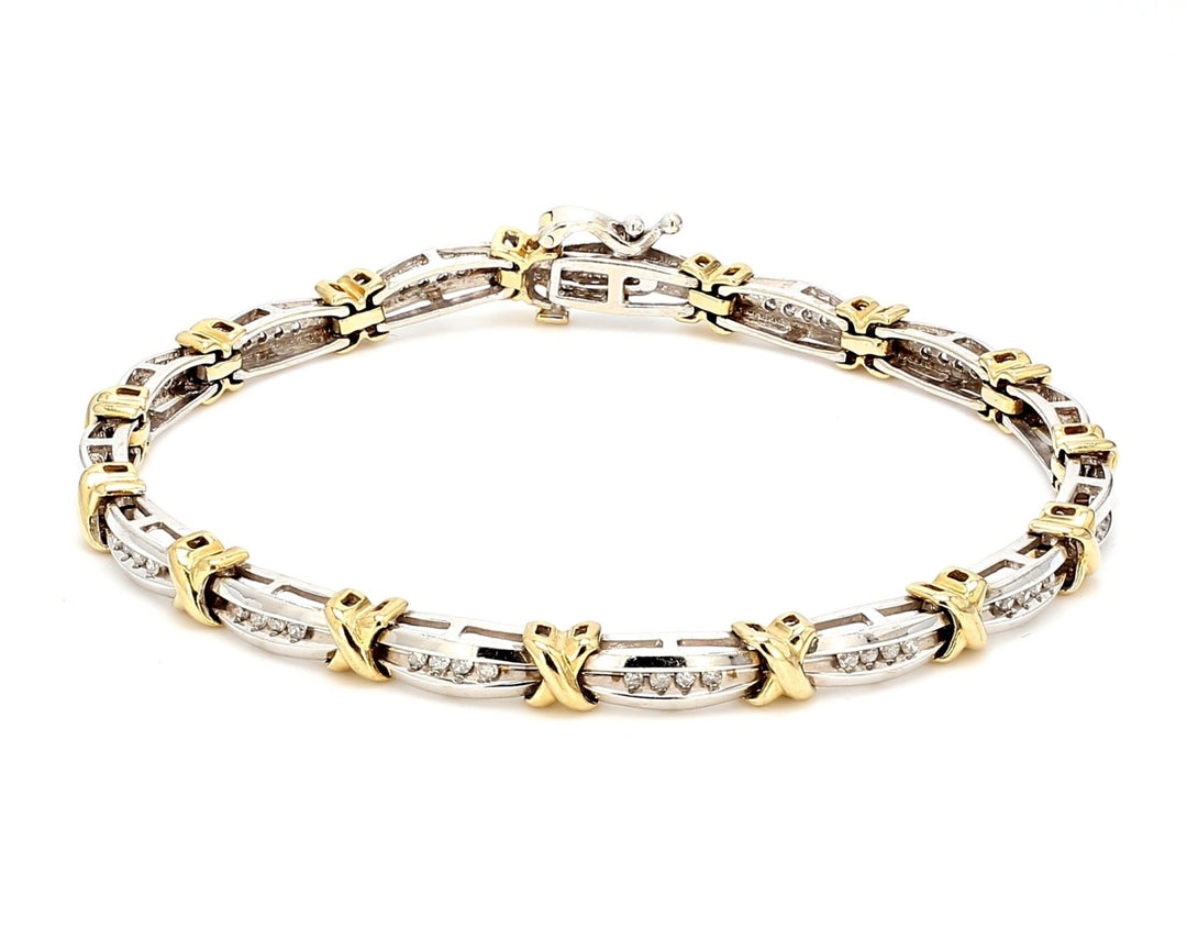 7"" Bracelet 10K two-tone with channel set round diamonds.  D0.30ct.t.w.