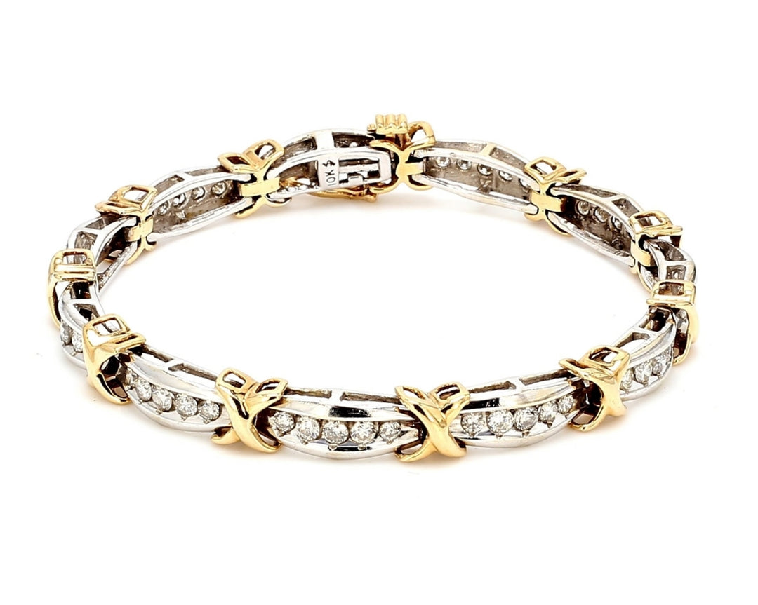 7"" Bracelet in 10K two-tone with channel set round diamonds.  D3.00ct.t.w.