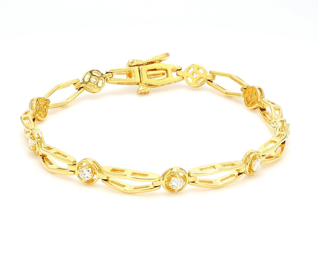7"" Bracelet in 18K YG with 4-prong set round diamonds.  D0.60ct.t.w.