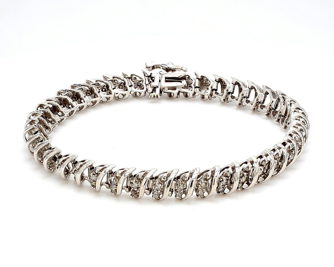 7.5"" Bracelet S-style in 10K WG with prong set round diamonds.  D2.00ct.t.w.