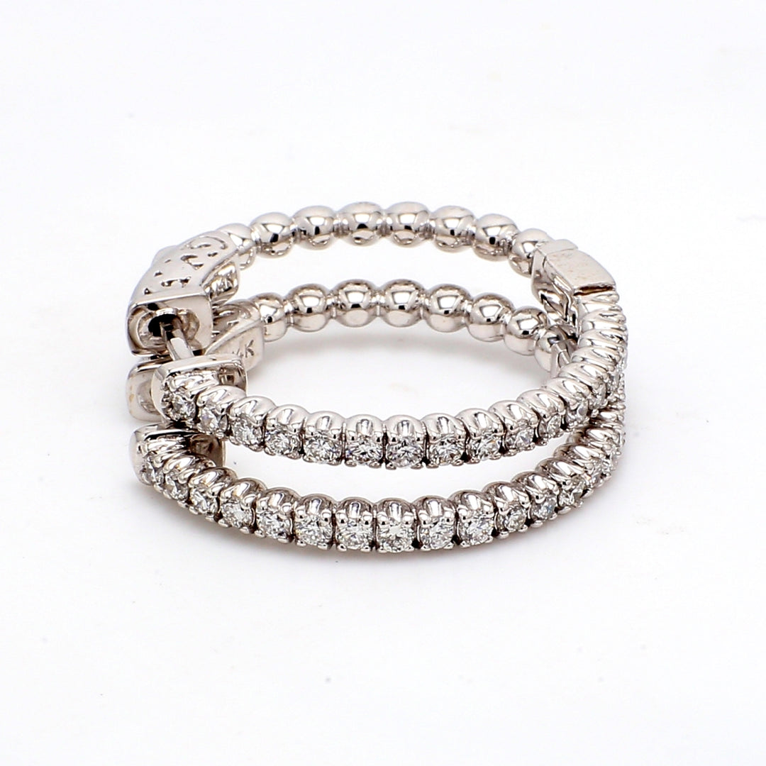 1"" Hoop earrings with U-prong set (34) round diamonds & with special spring lock.  D0.77ct.t.w.
