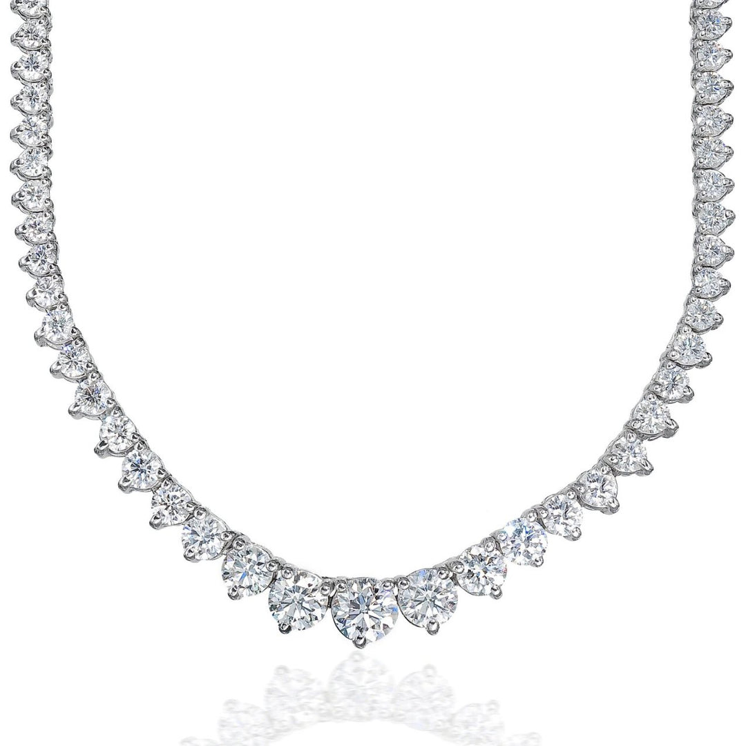 16.5"" Graduated tennis necklace in 18K WG with 3-prong set round diamonds.  D18.10ct.t.w.  (Center 1.09ct.)