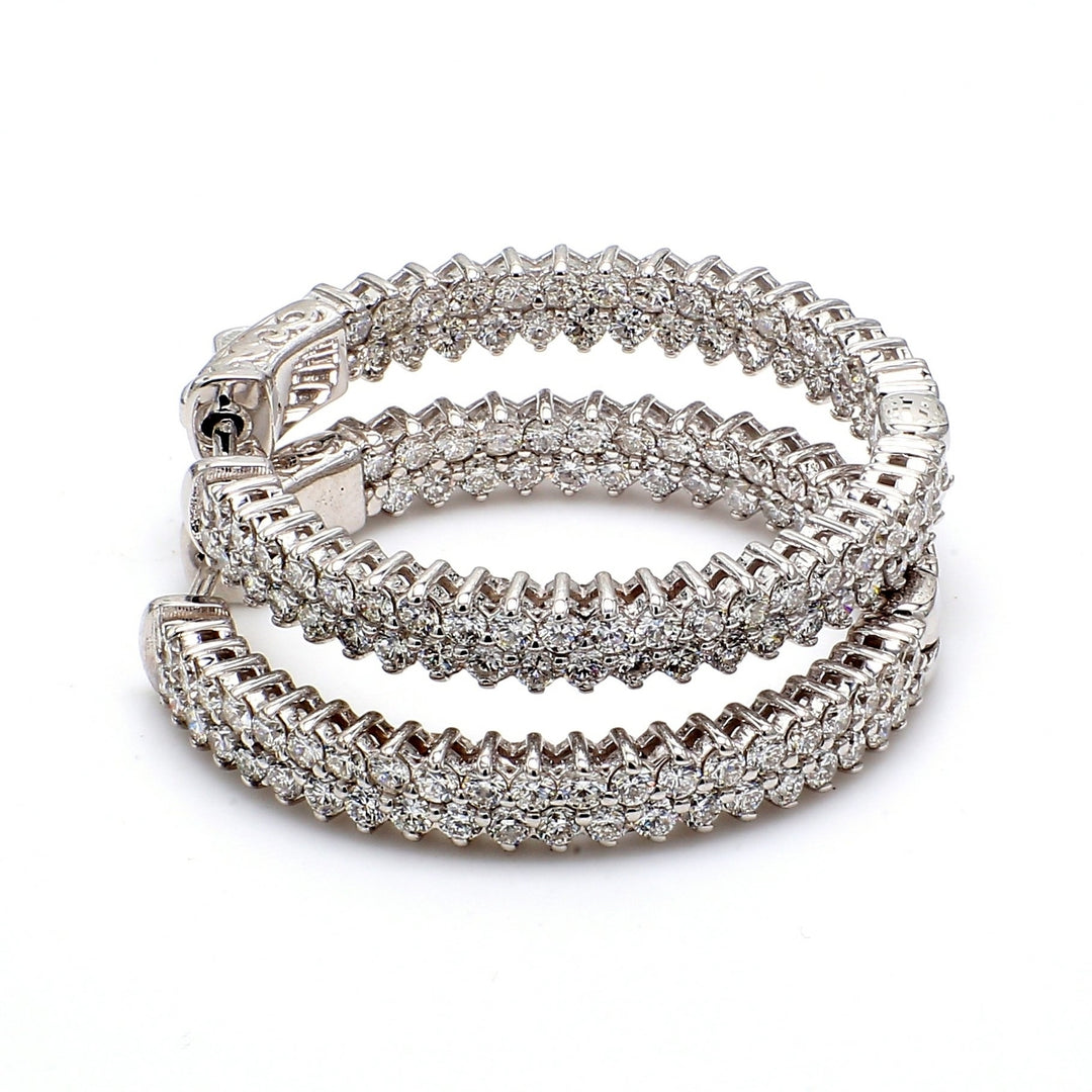 1.25"" Inside out hoop earrings with 2-row prong set (146) round diamonds & with special spring lock.  D3.04ct.t.w.