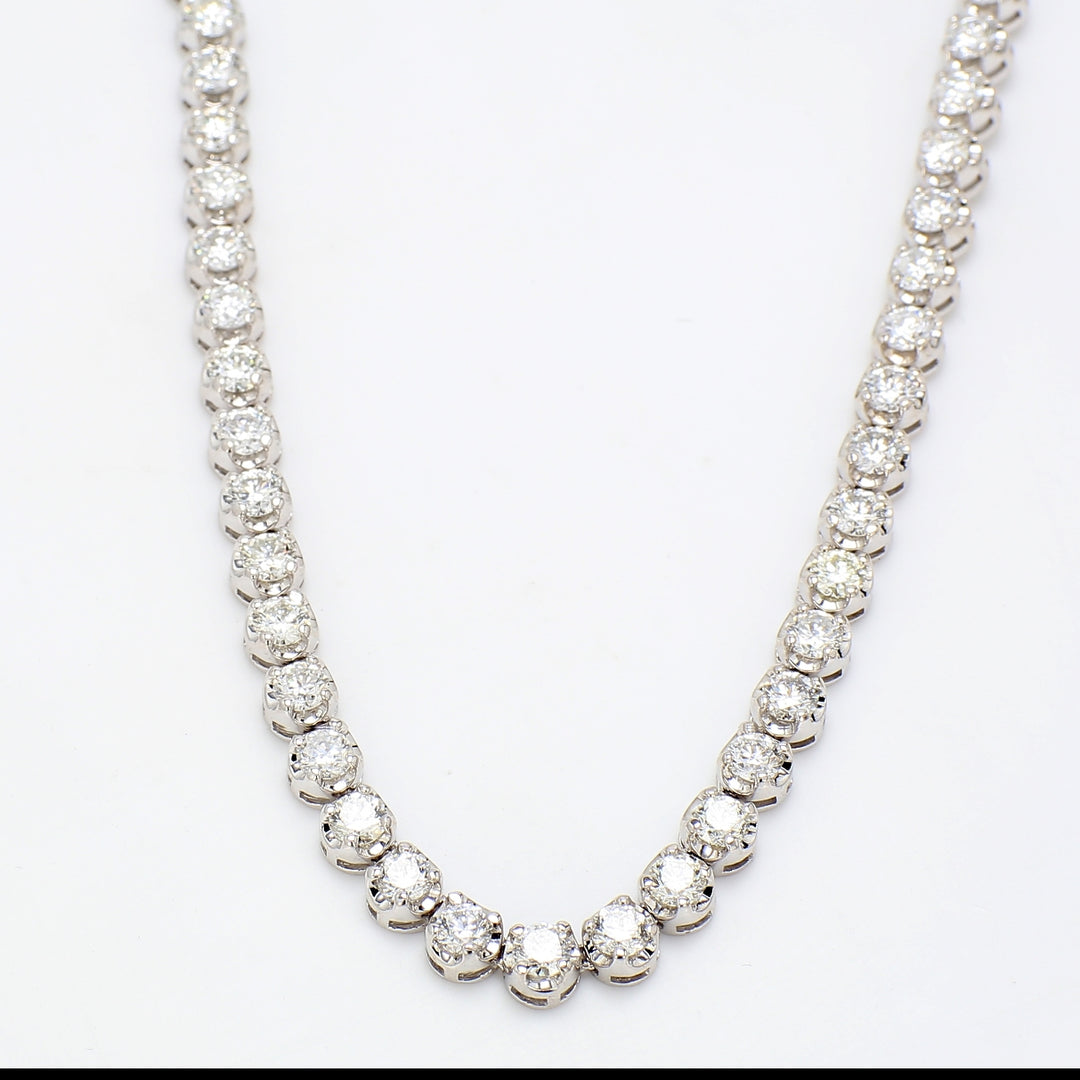 17"" Straight line illusion tennis necklace with 4-prong set round diamonds.  D16.32ct.t.w.