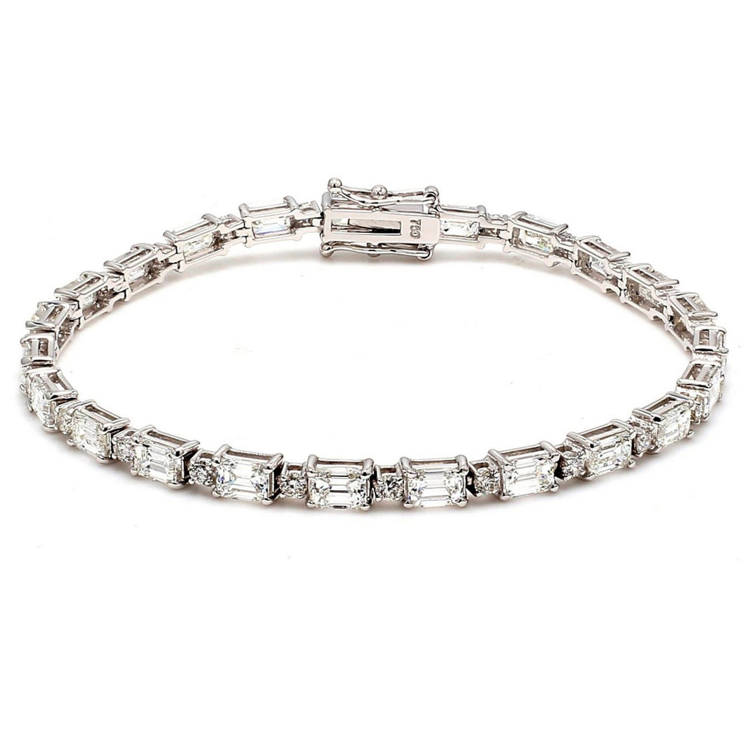 7"" Tennis bracelet in 18K WG with alternating 4-prong set (23) round and (23) emerald cut diamonds.  D8.12ct.t.w.
