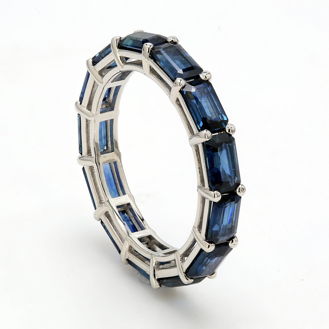 Eternity band in platinum with shared prong set sapphire.  Sapphires 4.14ct.t.w.