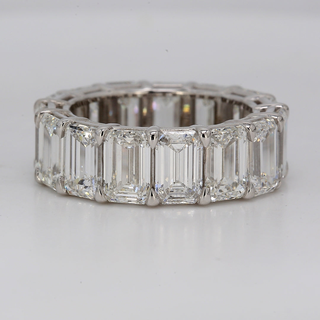 Eternity band in platinum with basket eagle claw set GIA certified E-G/VVS-VS (15) emerald cut diamonds.  D11.02ct.t.w.  Size 6.5
