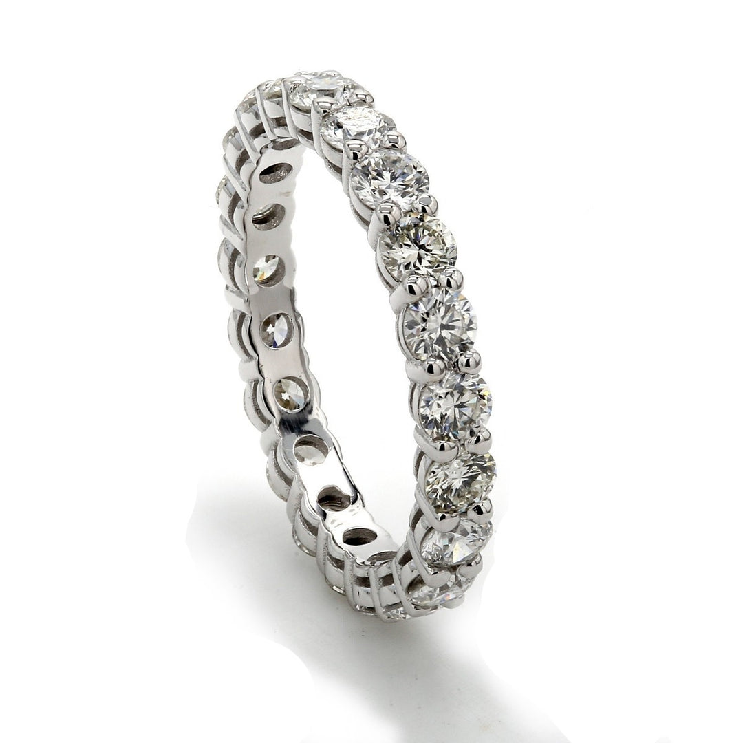 Eternity band with shared prong set round diamonds.  D2.04ct.t.w.
