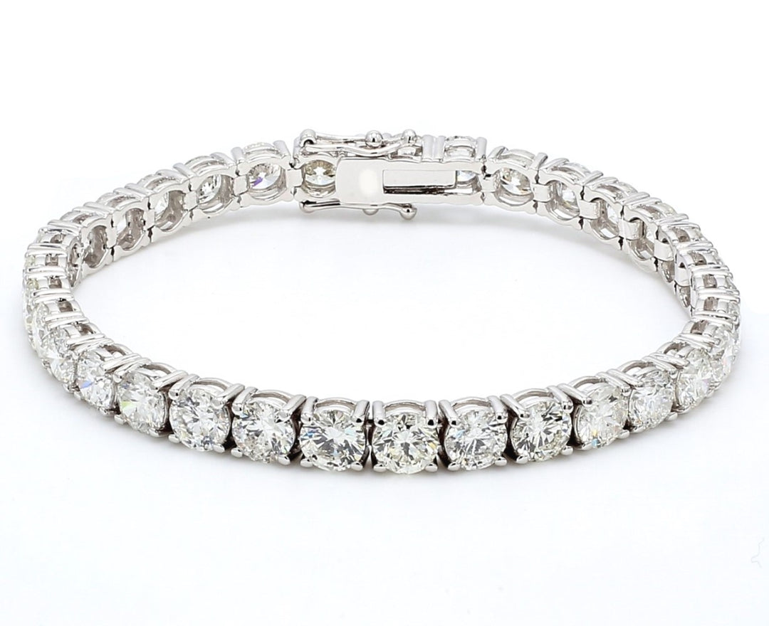 7"" Tennis bracelet in 18K WG with 4-prong set (38) round diamonds.  D11.69ct.t.w.
