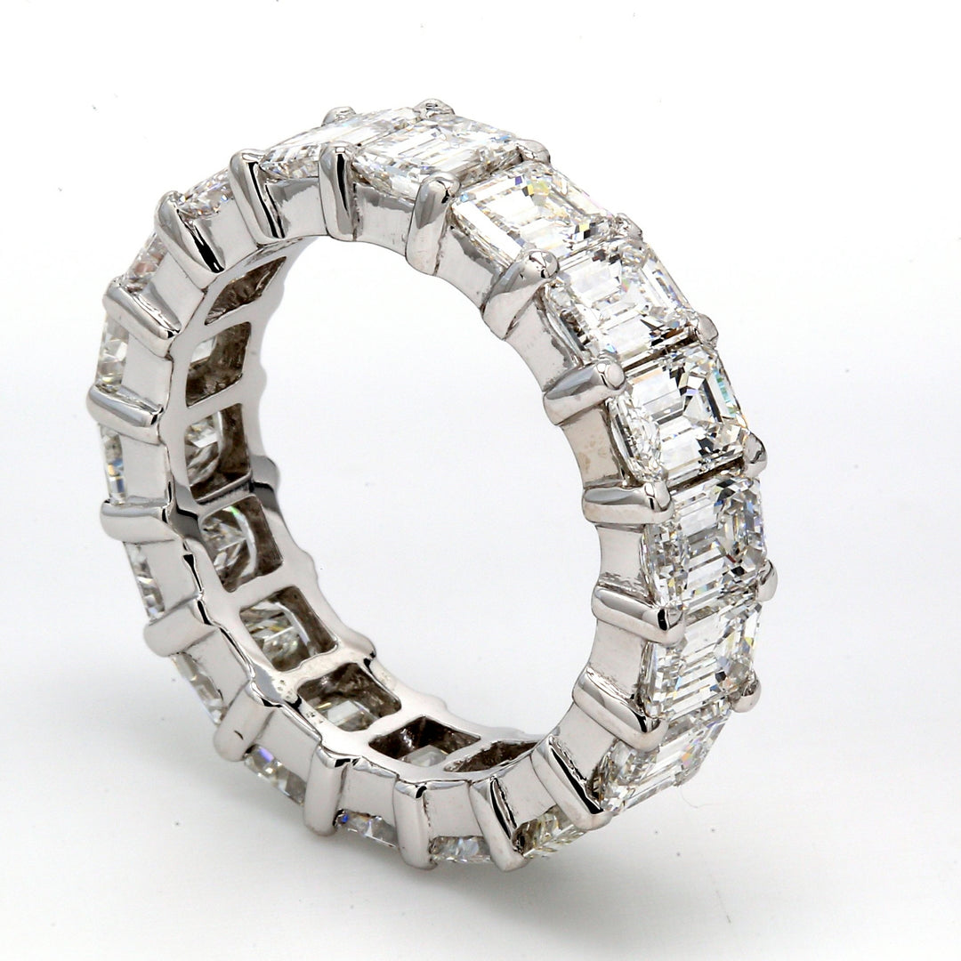 Eternity band with shared prong set (25) emerald cut diamonds.  D3.41ct.t.w.  Size 6