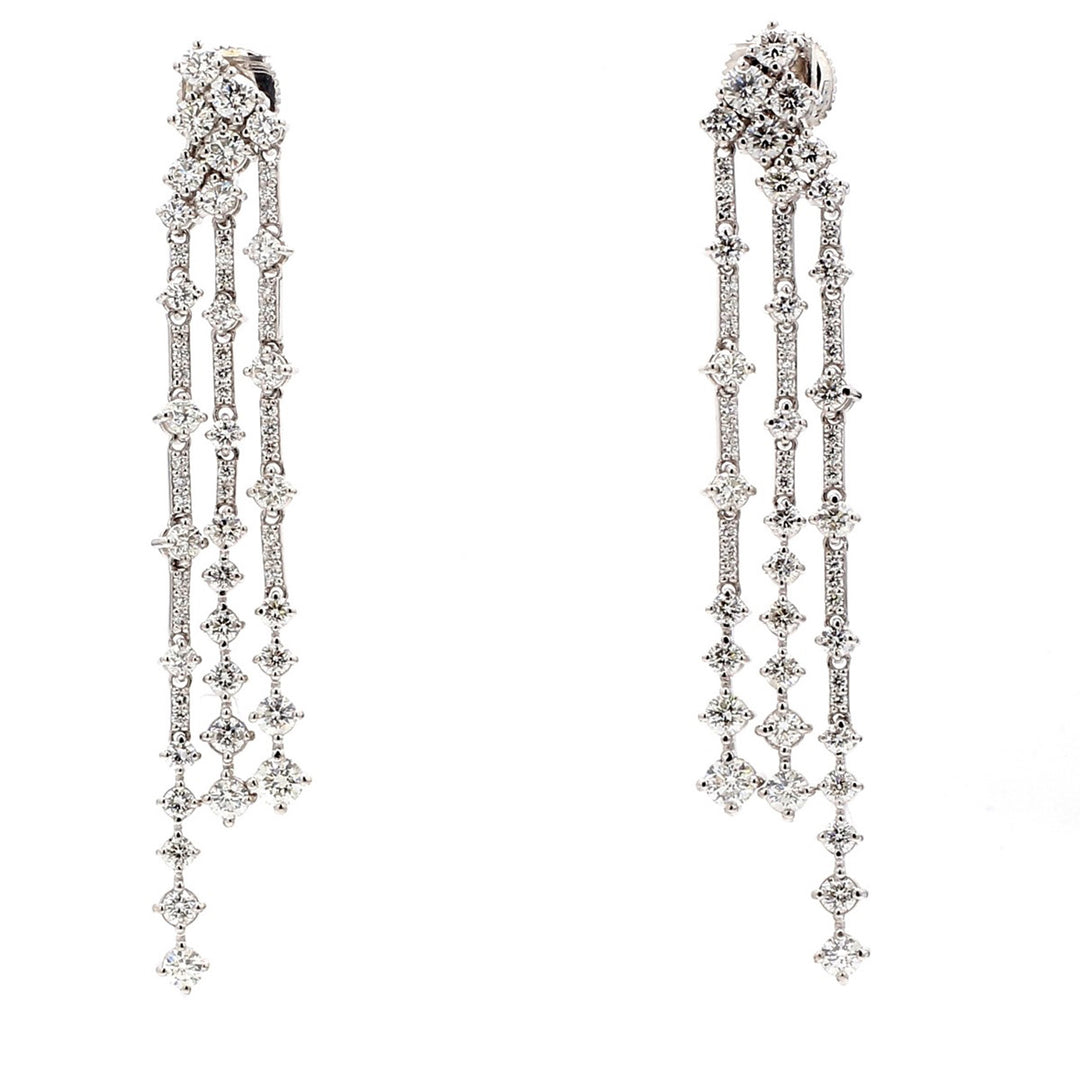 Chandelier style dangling earrings with prong set round diamonds.  D4.65ct.t.w.