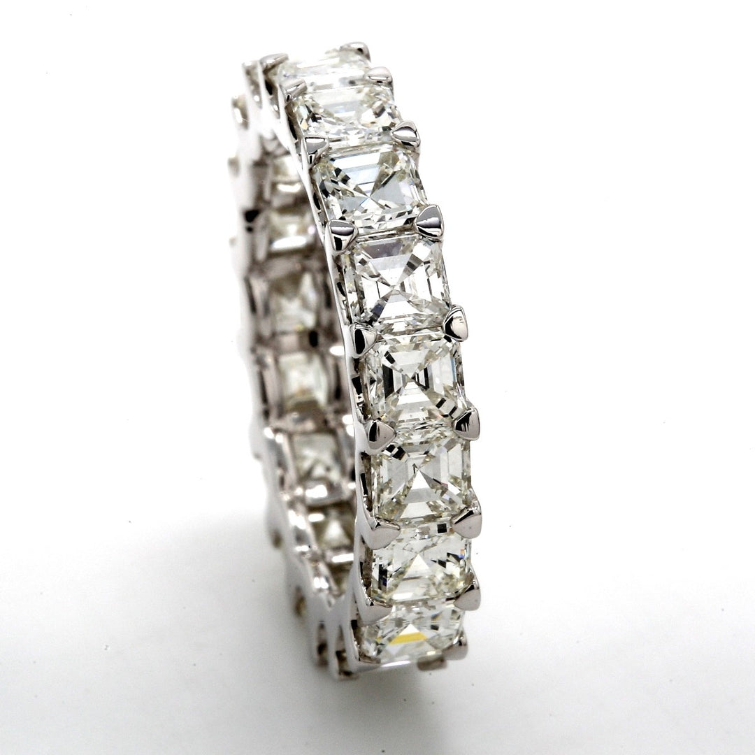 Eternity band with U-prong set (19) asscher cut diamonds.  D5.11ct.t.w.  Size 6.75