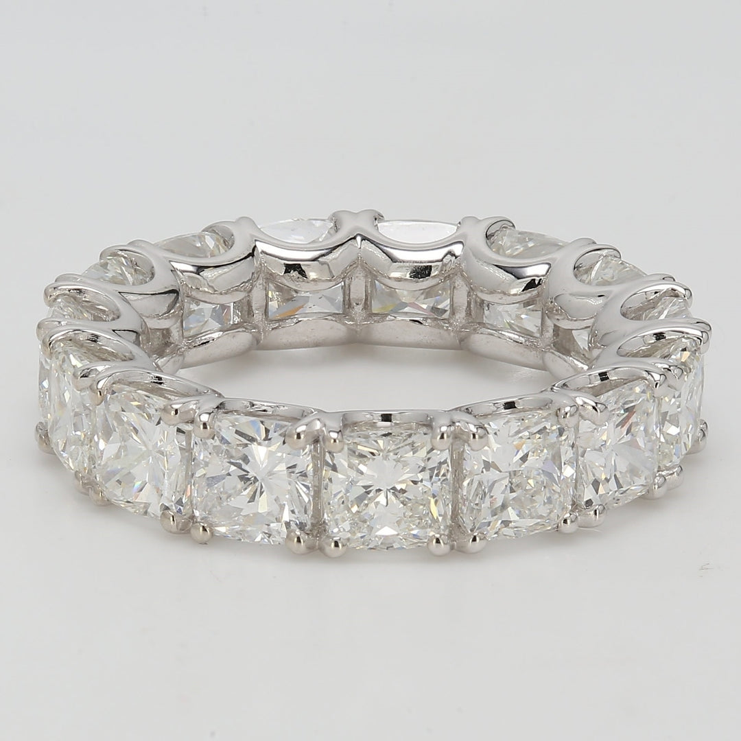 Eternity band with U-prong set (19) cushion cut diamonds.  D6.02ct.t.w.  Size 6.5