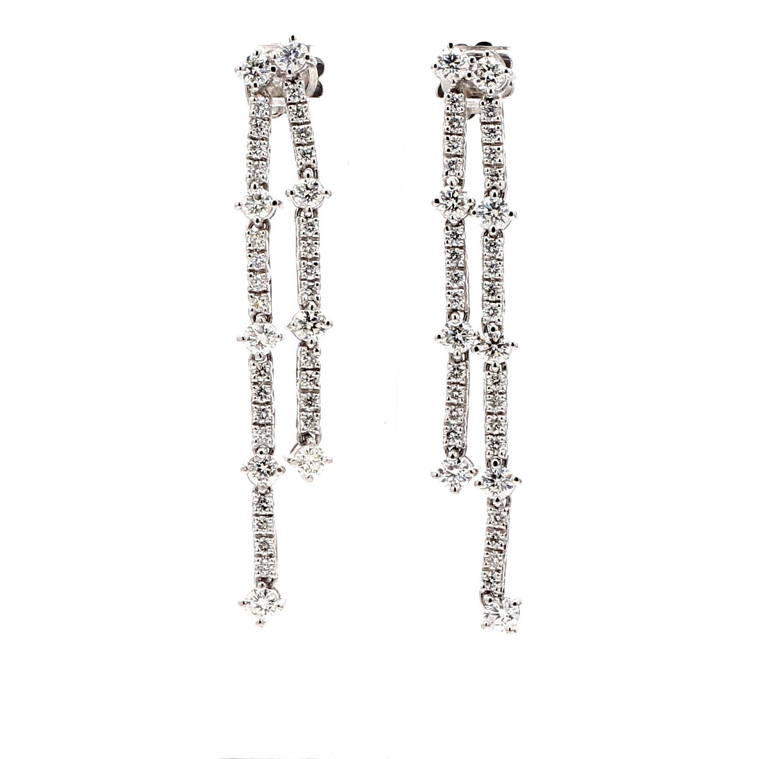 Chandelier style dangling earrings with prong set round diamonds.  D2.36ct.t.w.