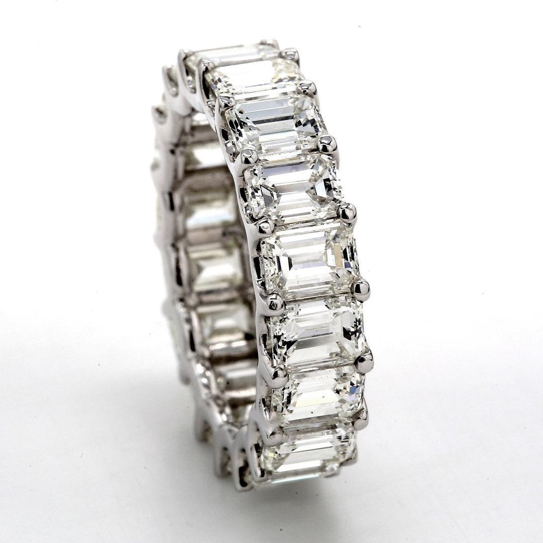 Eternity band with U-prong set (18) emerald cut diamonds.  D7.67ct.t.w.  Size 5.75