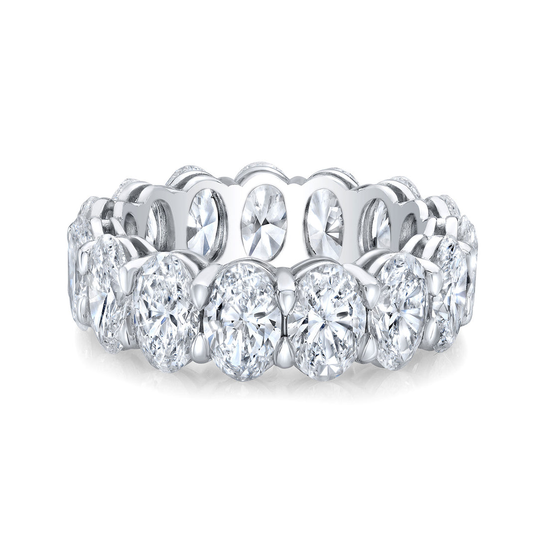 Eternity band in platinum with basket eagle claw set G/SI (15) oval diamonds.  D7.62ct.t.w.  Size 6.5