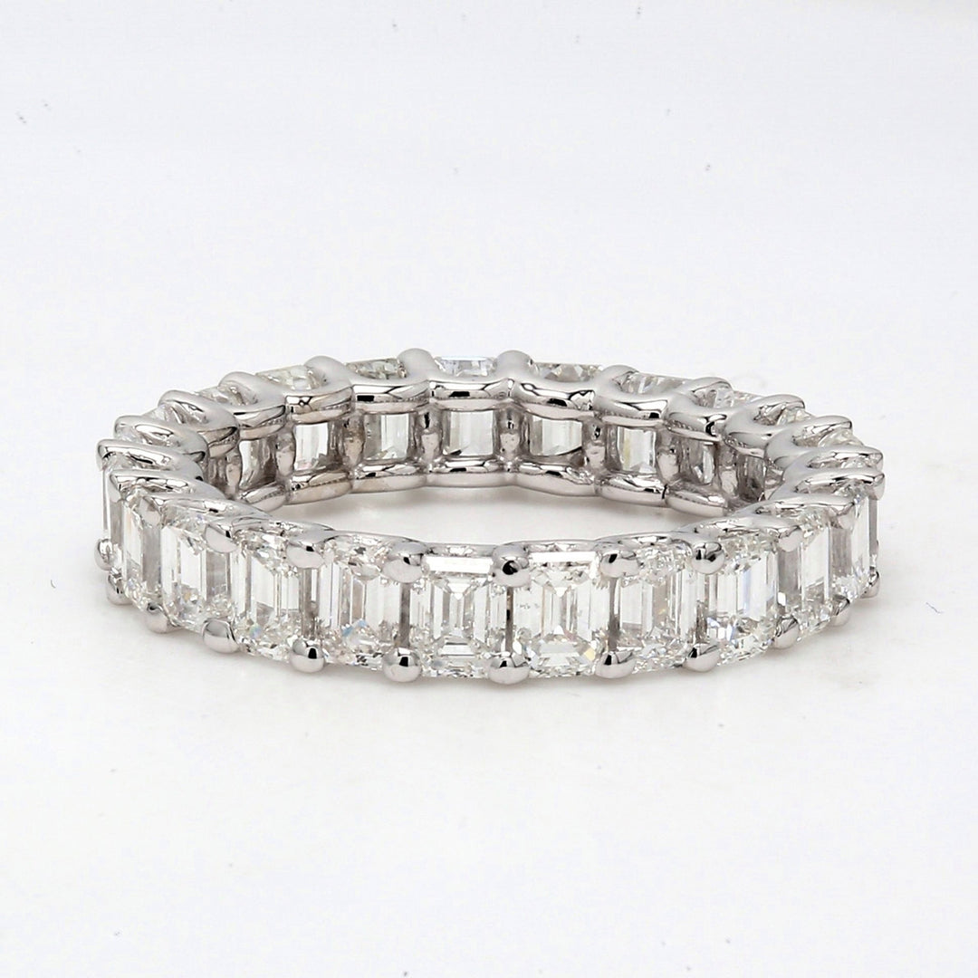 Eternity band in 18K WG with U-prong set (23) emerald cut diamonds.  D4.61ct.t.w.  Size 6