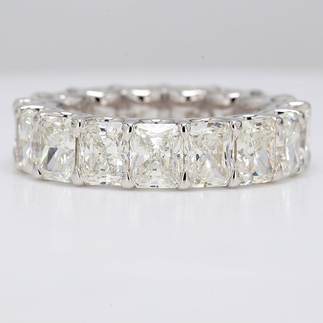 Eternity band in platinum with U-prong set G-H/VVS-VS (17) radiant cut diamonds.  D12.78ct.t.w.  Size 8.25