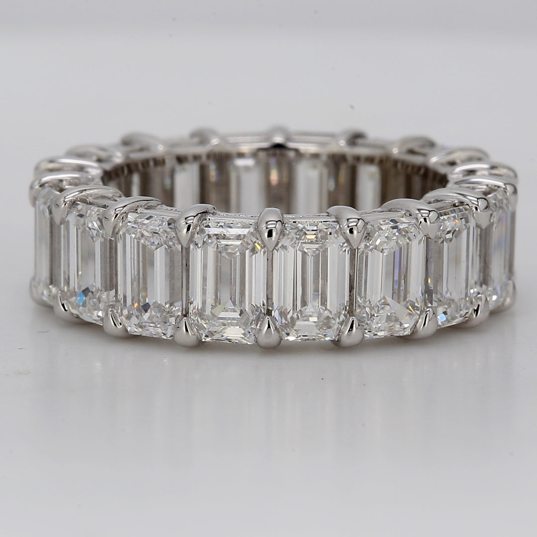 Eternity band in platinum with basket claw set GIA certified D-E/IF-VS (18) emerald cut diamonds.  D9.02ct.t.w.  Size 6