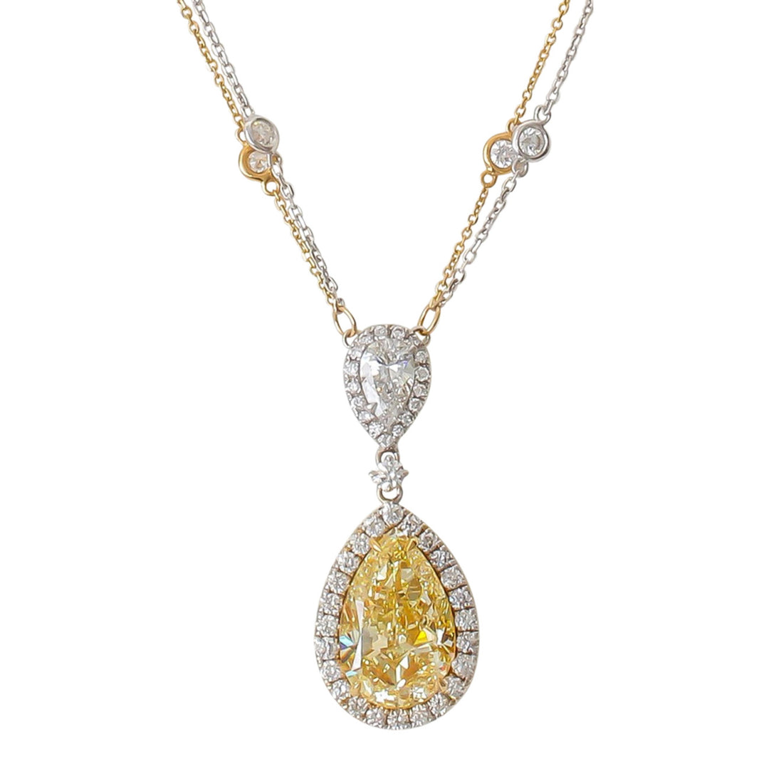 Halo necklace in 18K two-tone with French pave rounds around GIA certified FY/VS1 pear shape center and diamonds by the yard necklace attached on the pendant.  D14.02ct.t.w.  (Center 10.13ct.)