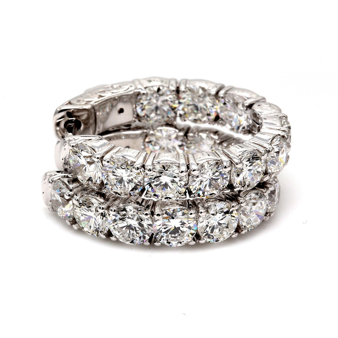 0.75"" Inside out hoop earrings with 4-prong set (20) round diamonds & with special spring lock.  D5.00ct.t.w.
