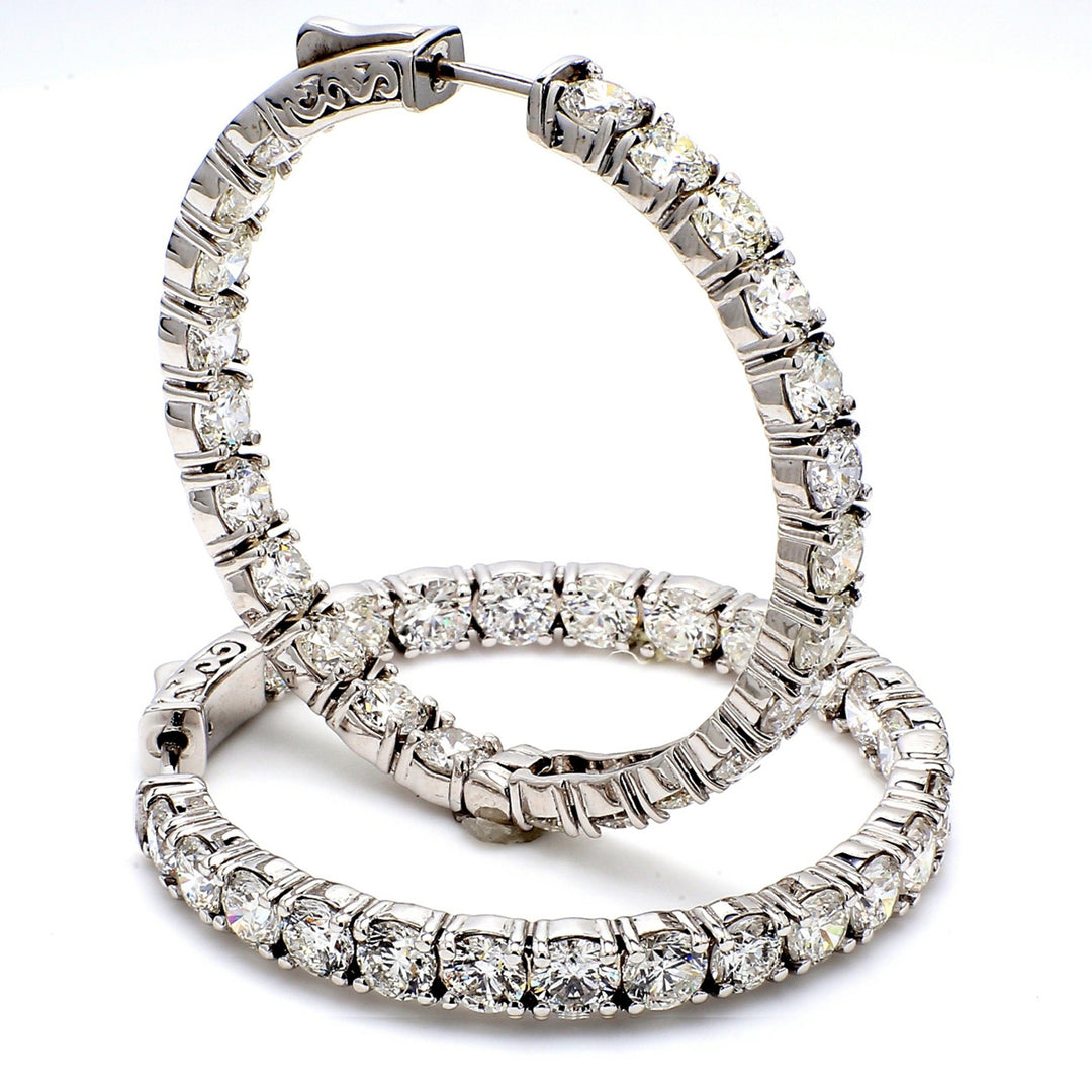 1.25"" Inside out hoop earrigs with 4-prong set (34) round diamonds & with special spring lock.  D8.68ct.t.w.