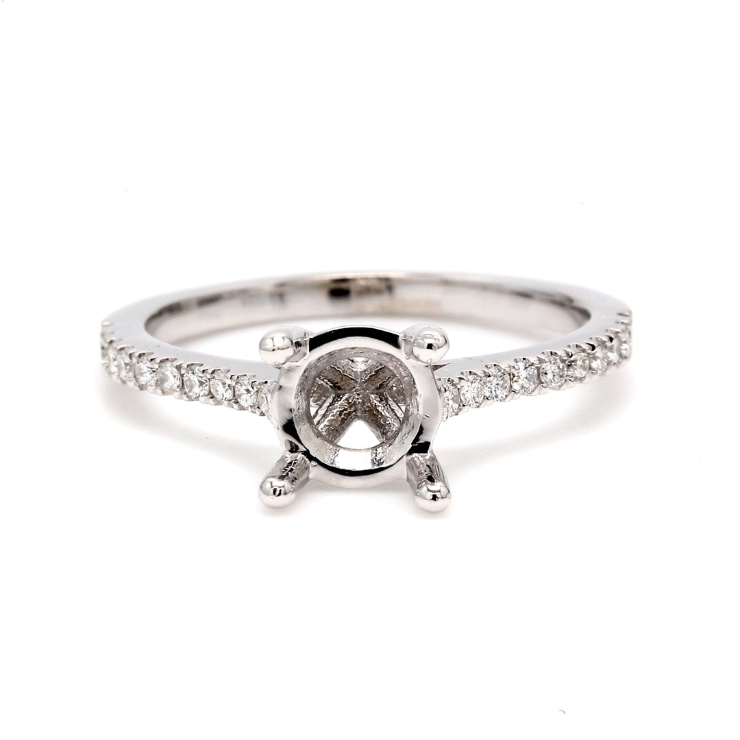 Semi-mount with 4-prong set round diamonds.  D0.18ct.t.w.  Size 6.5