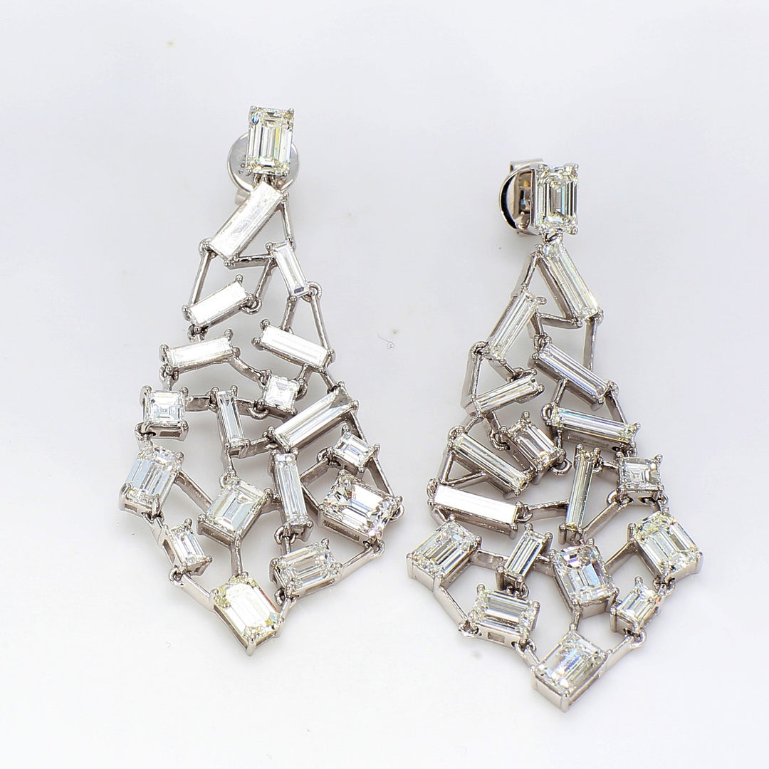 Free style chandelier earrings in 18K WG with prong set emerald, baguette, & asscher cut diamonds.  D8.05ct.t.w.