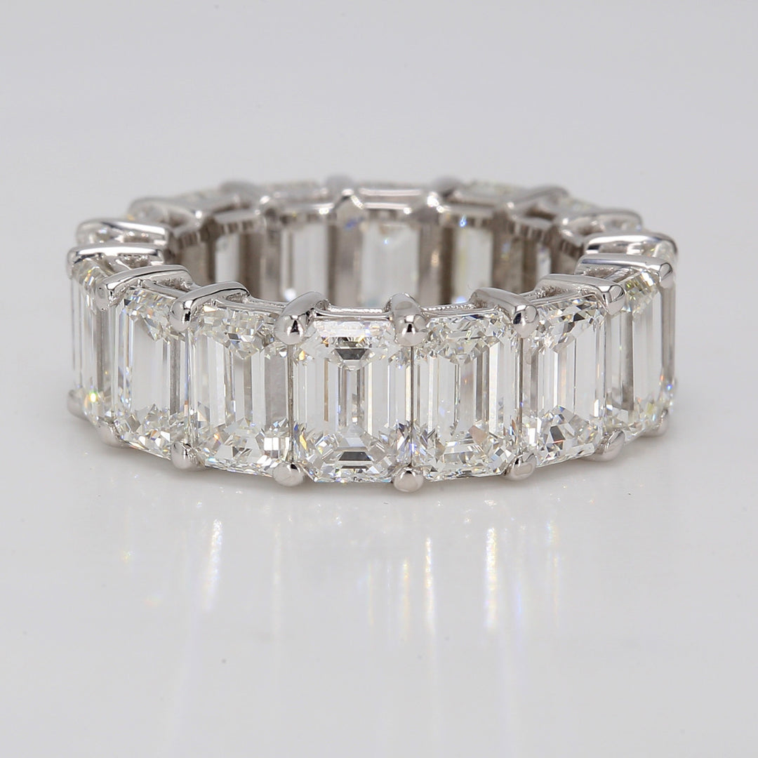 Eternity band in 18K WG with shared prong set (20) emerald cut diamonds.  D6.12ct.t.w.  Size 6.5