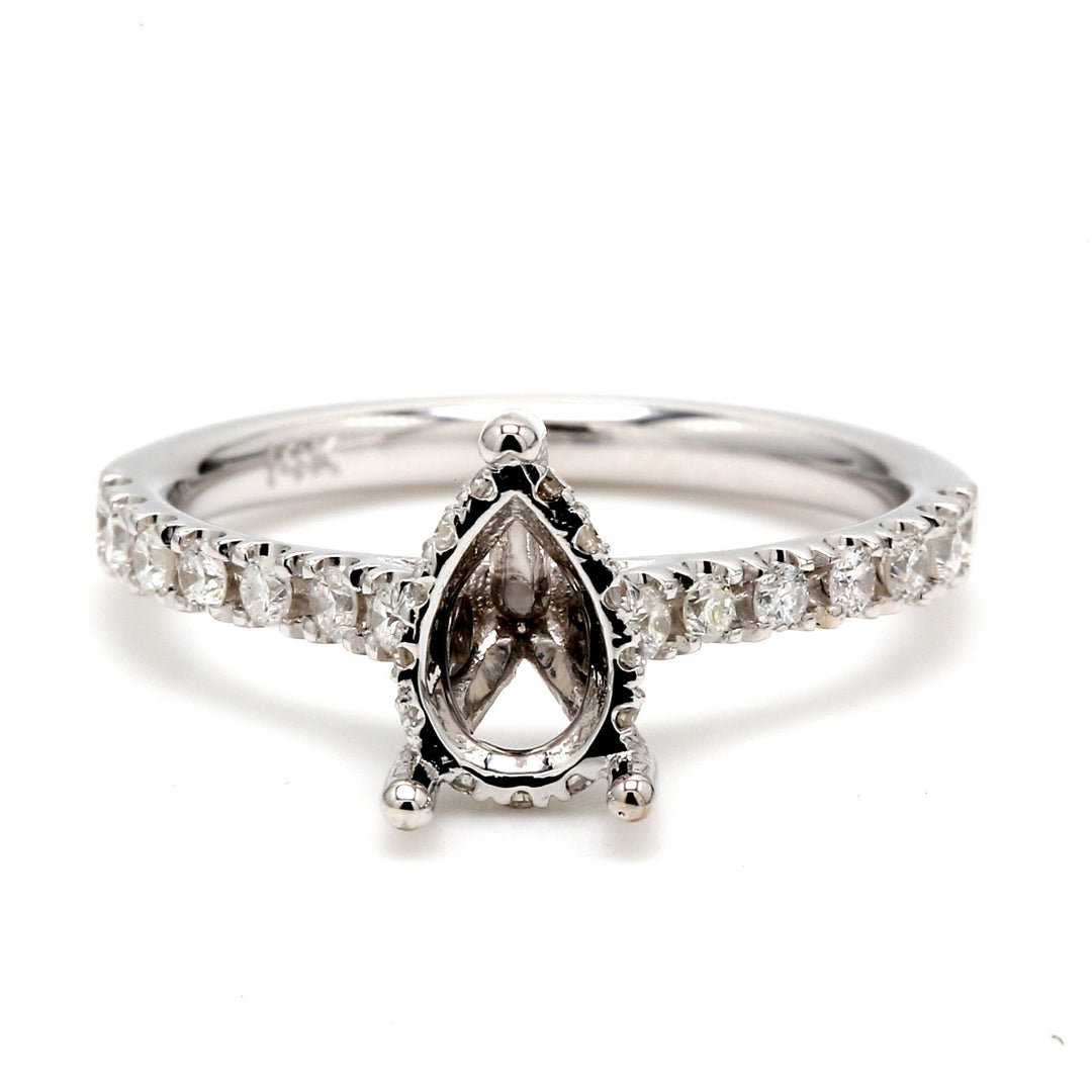 Semi-mount with prong set round diamonds.  D0.36ct.t.w.