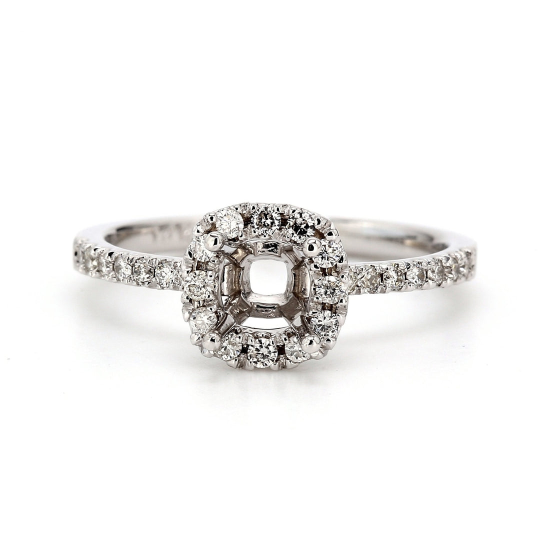 Halo semi-mount with pre-set round diamonds.  D0.30ct.t.w.  Size 6.25