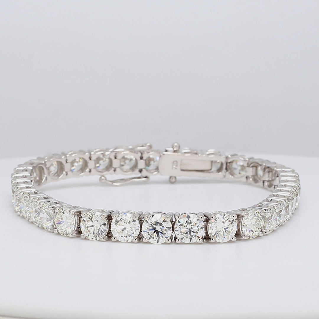 Tennis bracelet in 18K WG with double basket pront set GIA certified H-I/SI1-2 (33) round diamonds.  D16.78ct.t.w.