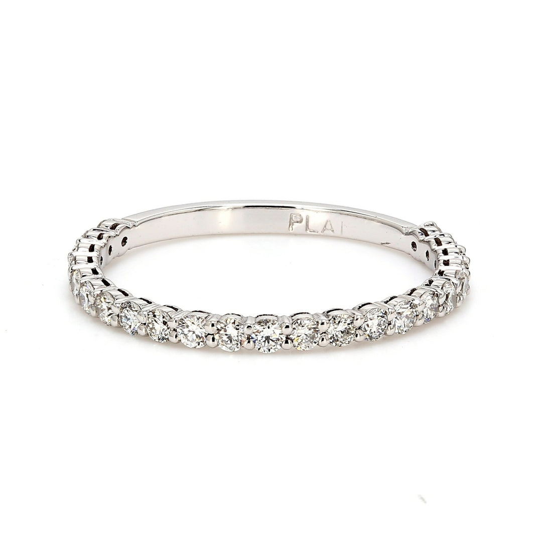 Band in platinum with shared prong set round diamonds.  D0.41ct.t.w.