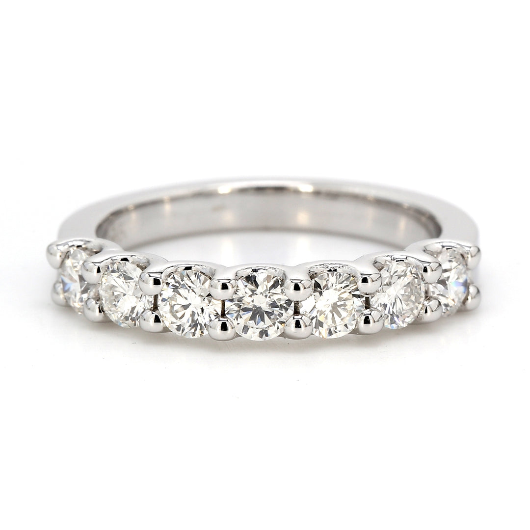 7-stone band with U-prong set round diamonds.  D0.99ct.t.w.  Size 6.75