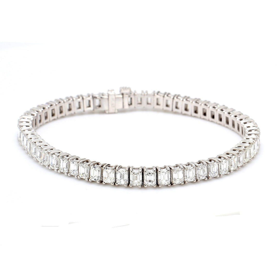 7"" Tennis bracelet in platinum with basket prong set (58) emerald cut diamonds.  D11.33ct.t.w.