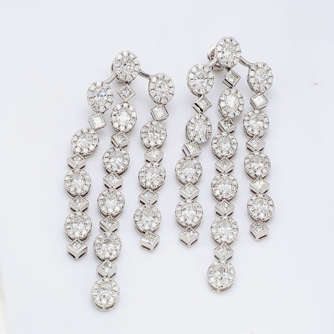 2.5"" Chandelier earrings in 18K WG with 3-line alternating halo ovals & bezel set princess cut diamonds.  D10.83ct.t.w.